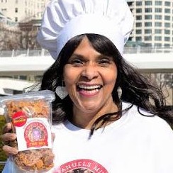 headshot of jacqulyn tucker holding package of emmanuel's mix
